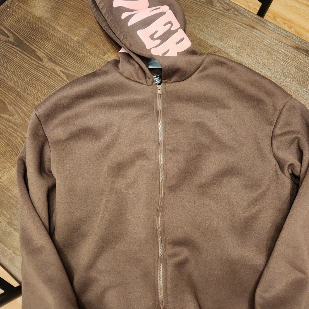 Brown oversized zip up jacket " knowledge is power"